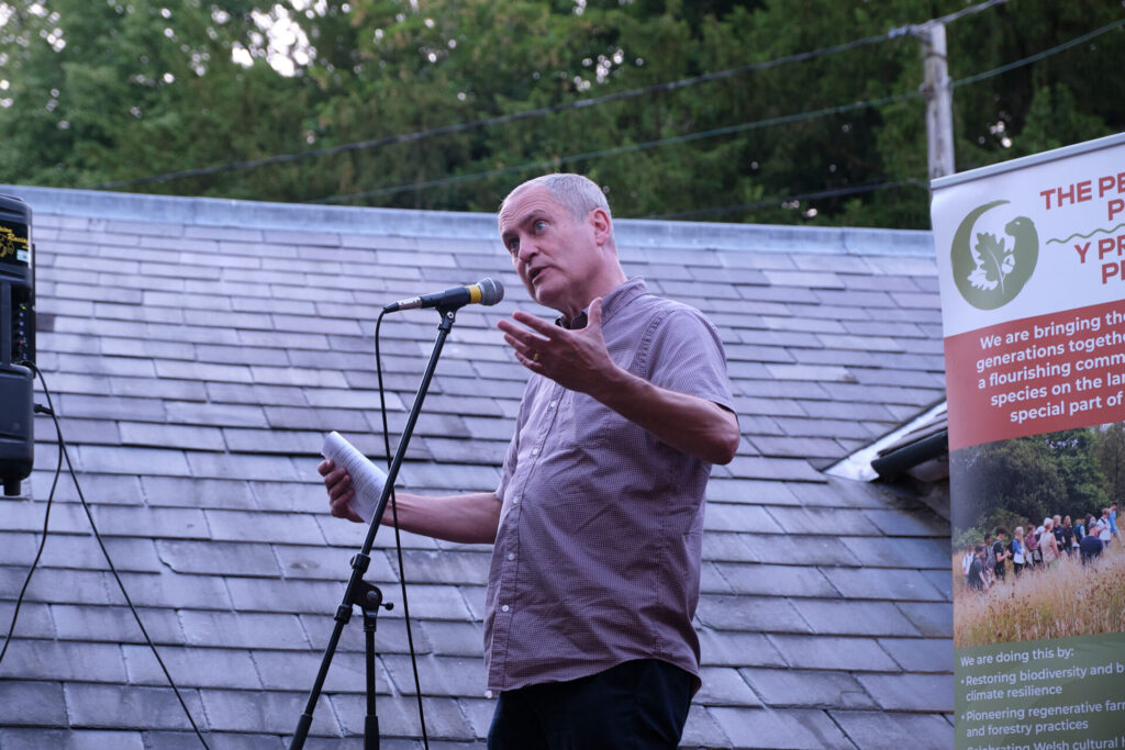 Poet, Ifor, doing a live performance at the exhibition 